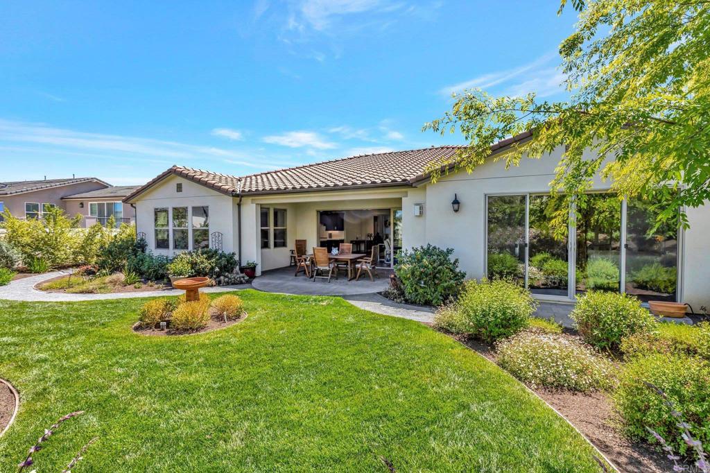 22005 Long Trot Drive Escondido, CA 92029 - Photo 32 of 51 a view of a house with furniture and garden