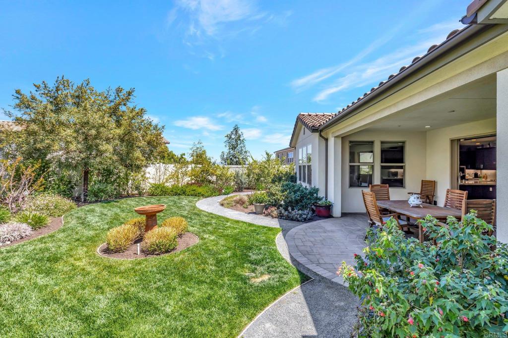 22005 Long Trot Drive Escondido, CA 92029 - Photo 35 of 51 a view of a chair and table in backyard of the house