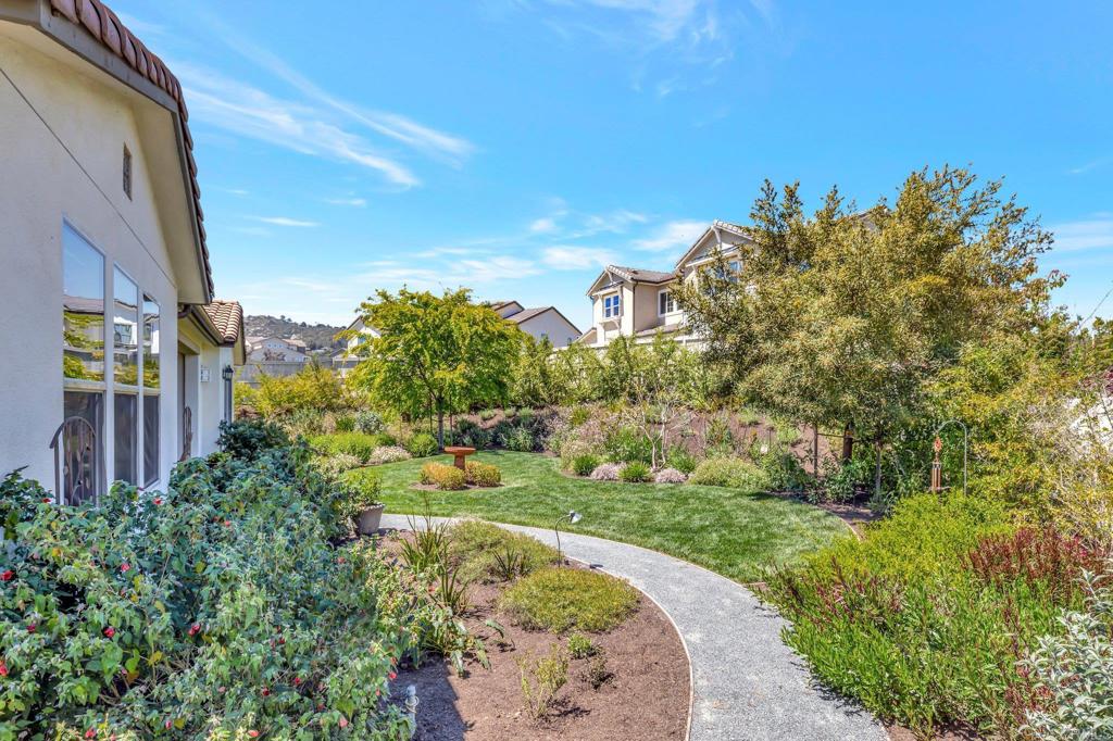 22005 Long Trot Drive Escondido, CA 92029 - Photo 37 of 51 a view of a pathway both side of building
