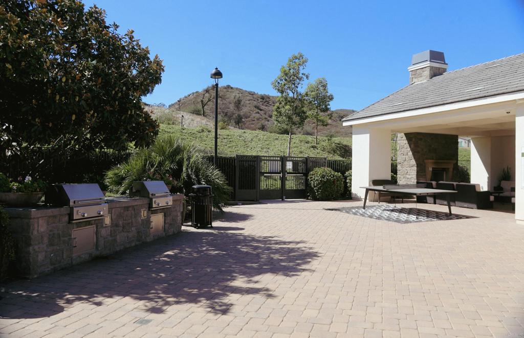 22005 Long Trot Drive Escondido, CA 92029 - Photo 44 of 51 a view of a house with backyard and sitting area