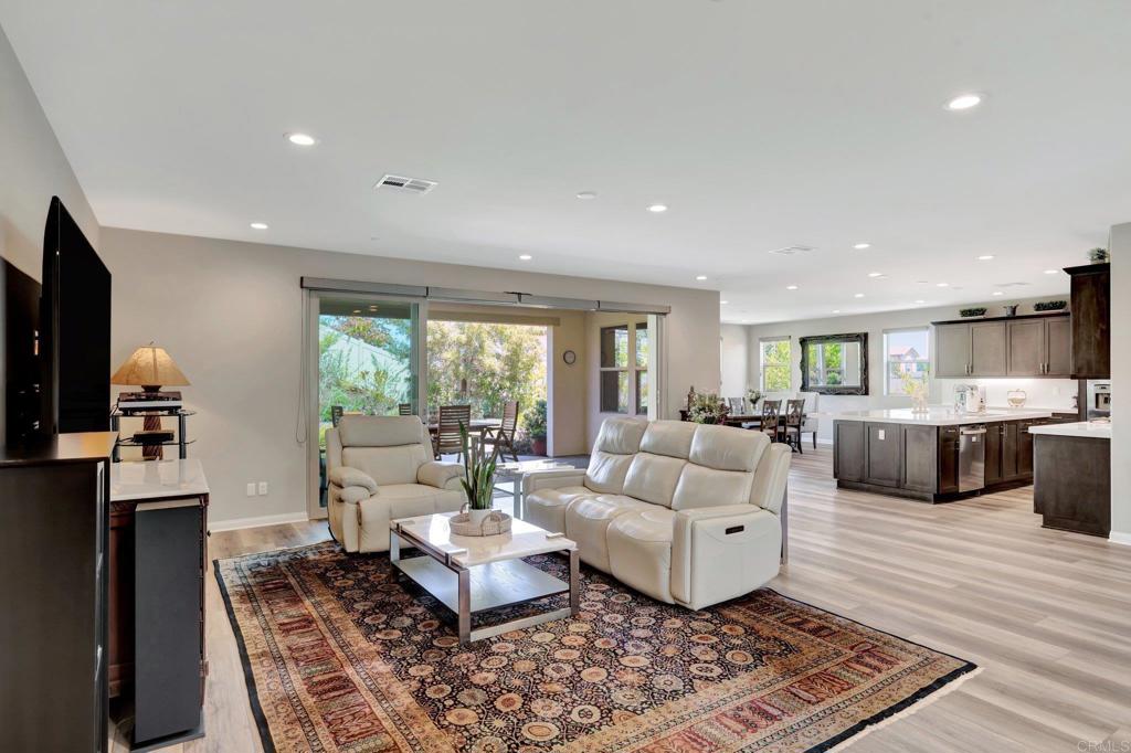 22005 Long Trot Drive Escondido, CA 92029 - Photo 10 of 51 a living room with furniture and a rug