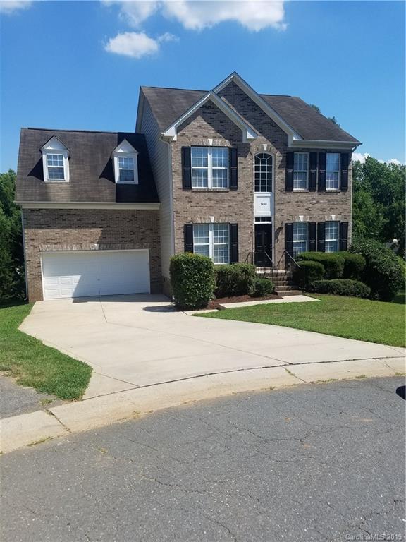 1450 Autumn Ridge Lane Fort Mill, SC 29708 - Photo 1 of 41 a front view of a house with a yard