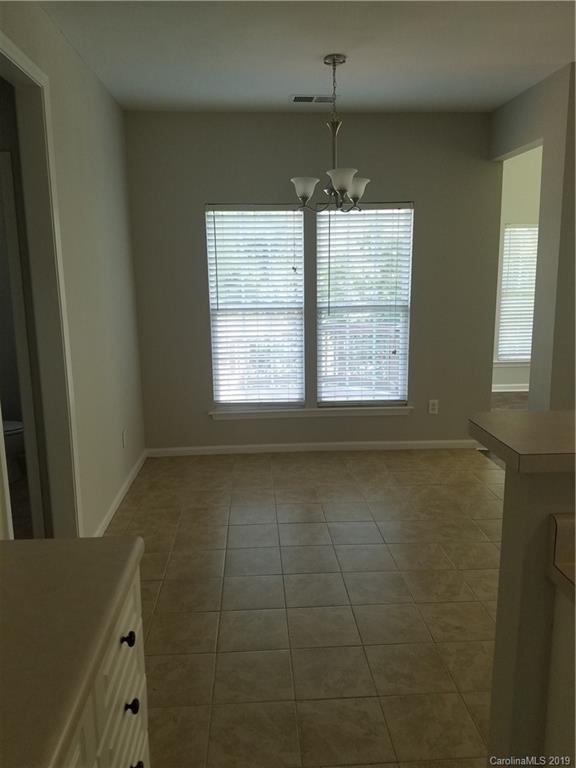 1450 Autumn Ridge Lane Fort Mill, SC 29708 - Photo 16 of 41 a view of an empty room with a window