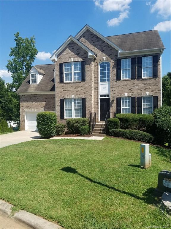 1450 Autumn Ridge Lane Fort Mill, SC 29708 - Photo 3 of 41 a front view of a house with a yard