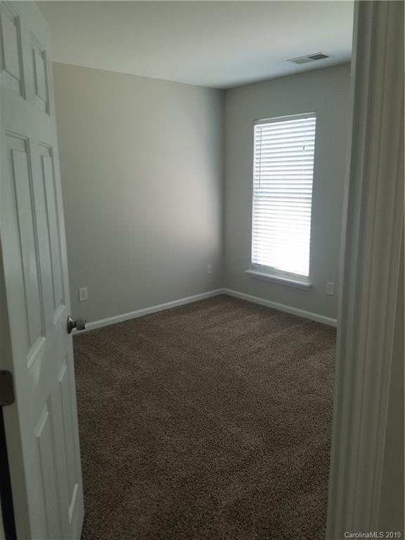 1450 Autumn Ridge Lane Fort Mill, SC 29708 - Photo 32 of 41 an empty room with a window