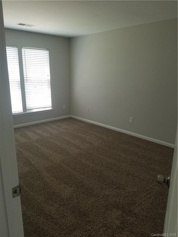 1450 Autumn Ridge Lane Fort Mill, SC 29708 - Photo 33 of 41 an empty room with a window