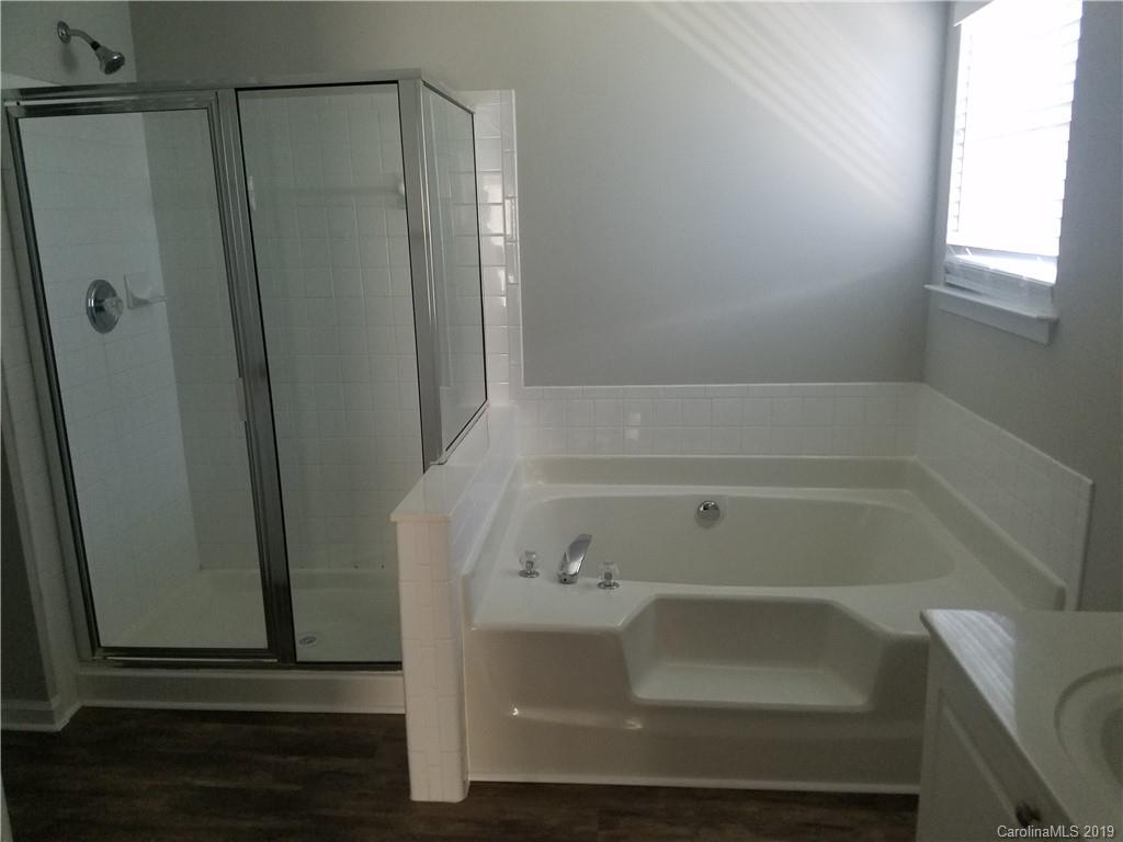 1450 Autumn Ridge Lane Fort Mill, SC 29708 - Photo 38 of 41 a bathroom with a bathtub