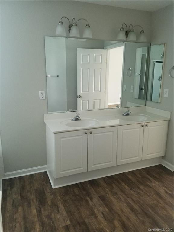 1450 Autumn Ridge Lane Fort Mill, SC 29708 - Photo 40 of 41 a bathroom with a sink and a mirror