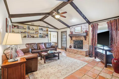 a bathroom with a shower sink and mirror