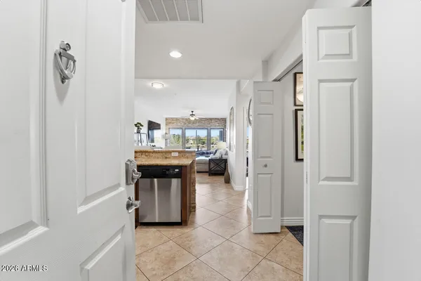 a kitchen with stainless steel appliances a refrigerator and a sink
