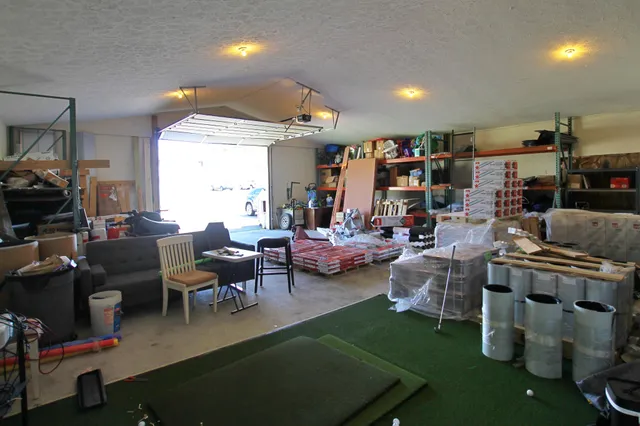 a room with furniture and workspace