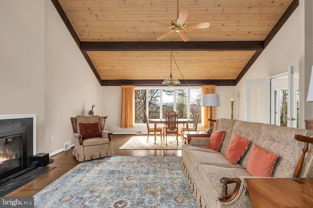 1493 Smith Run Road Bentonville, VA 22610 - Photo 15 of 40 Vaulted great room with wood burning fireplace