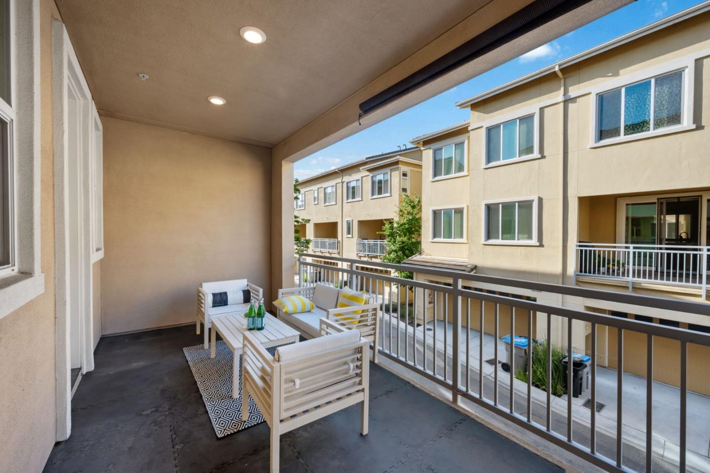 5977 Larkstone Loop San Jose, CA 95123 - Photo 27 of 63 a view of a balcony with chairs