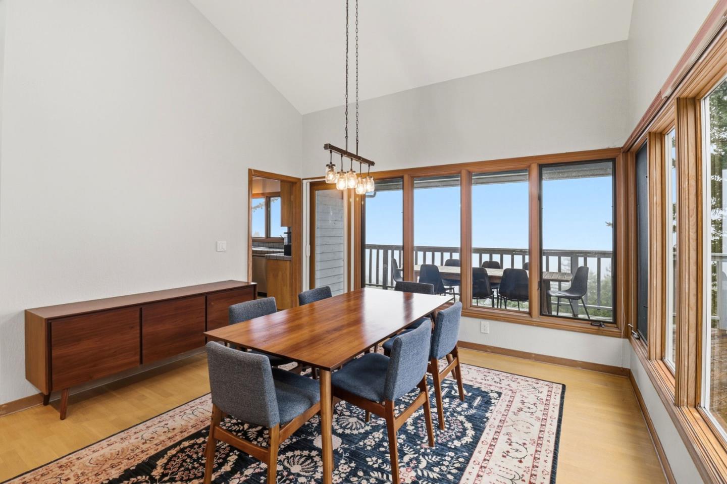 255 Allen Road Woodside, CA 94062 - Photo 17 of 42 a view of a dining room with furniture window and wooden floor