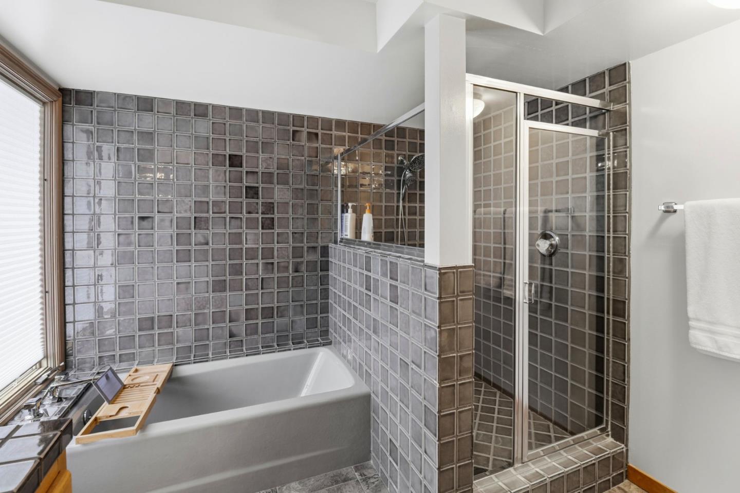 255 Allen Road Woodside, CA 94062 - Photo 23 of 42 a bathroom with a shower and a bathtub