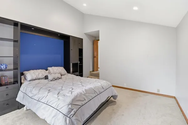 a bathroom with a shower and a toilet