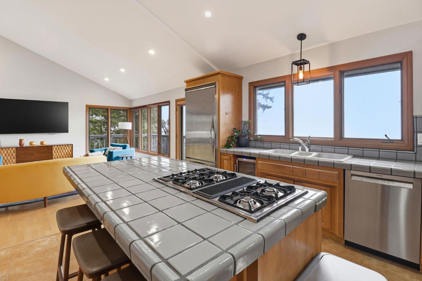 255 Allen Road Woodside, CA 94062 - Photo 8 of 42 a kitchen with a stove a sink and a refrigerator