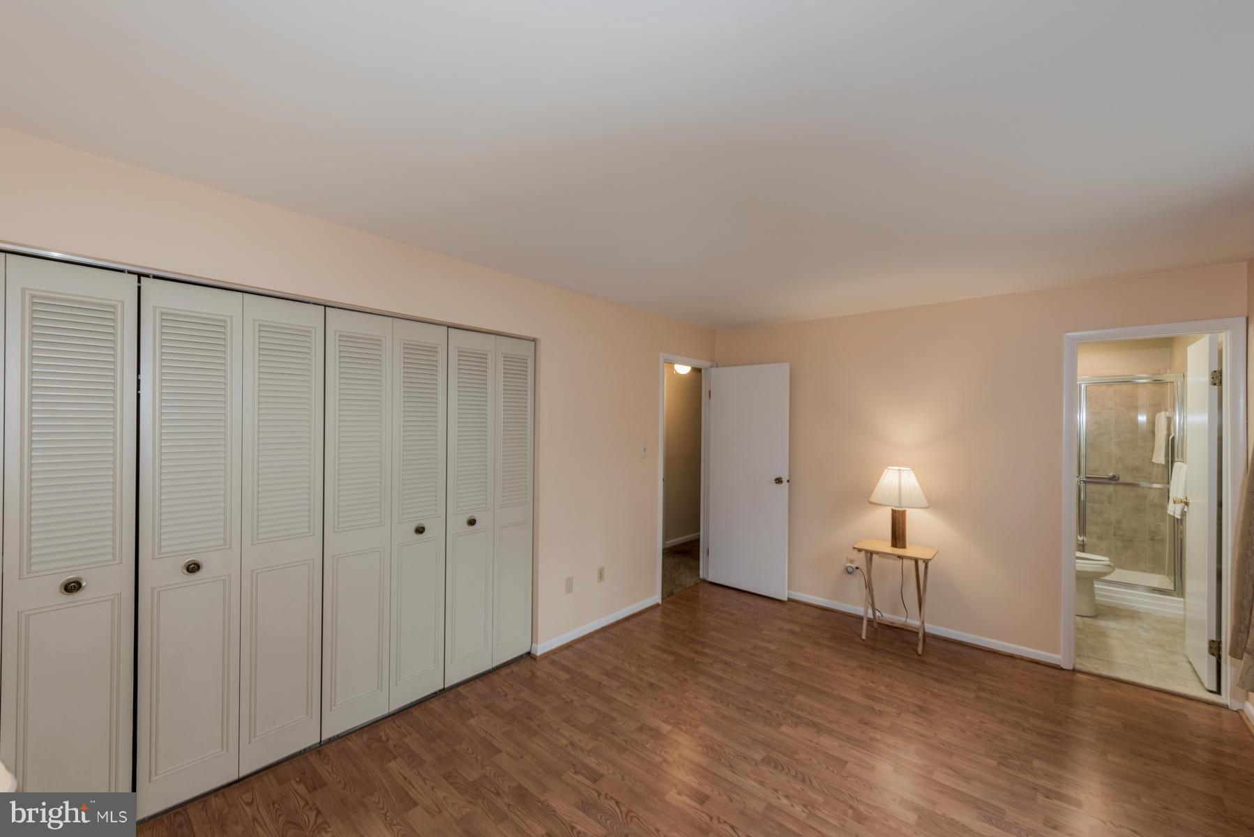 9466 Good Lion Road Columbia, MD 21045 - Photo 15 of 26 a view of empty room with wooden floor