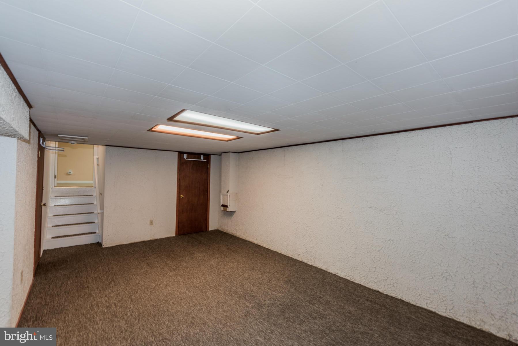 9466 Good Lion Road Columbia, MD 21045 - Photo 23 of 26 a view of an empty room with a garage