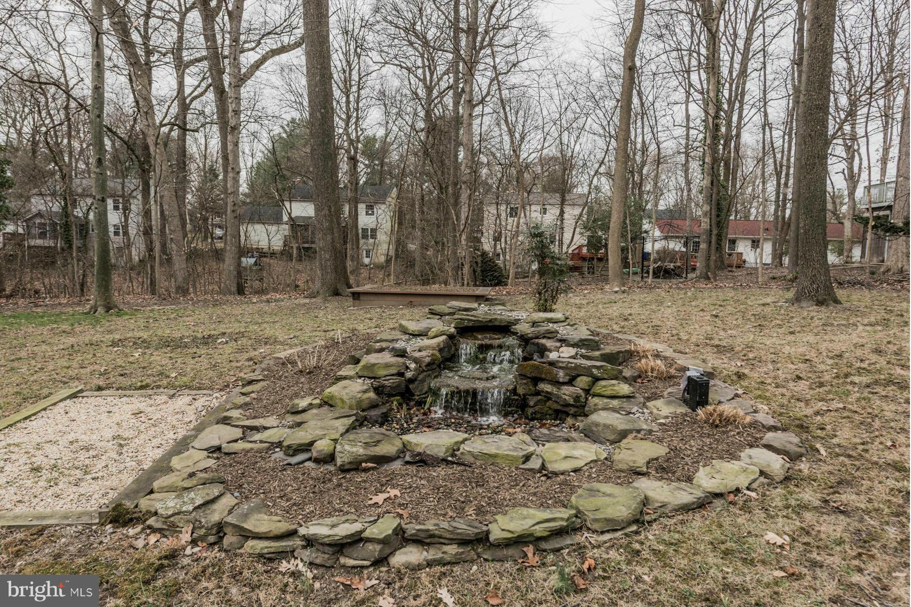 9466 Good Lion Road Columbia, MD 21045 - Photo 26 of 26 a view of a yard with trees