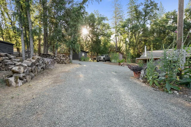 a view of street with houses and trees