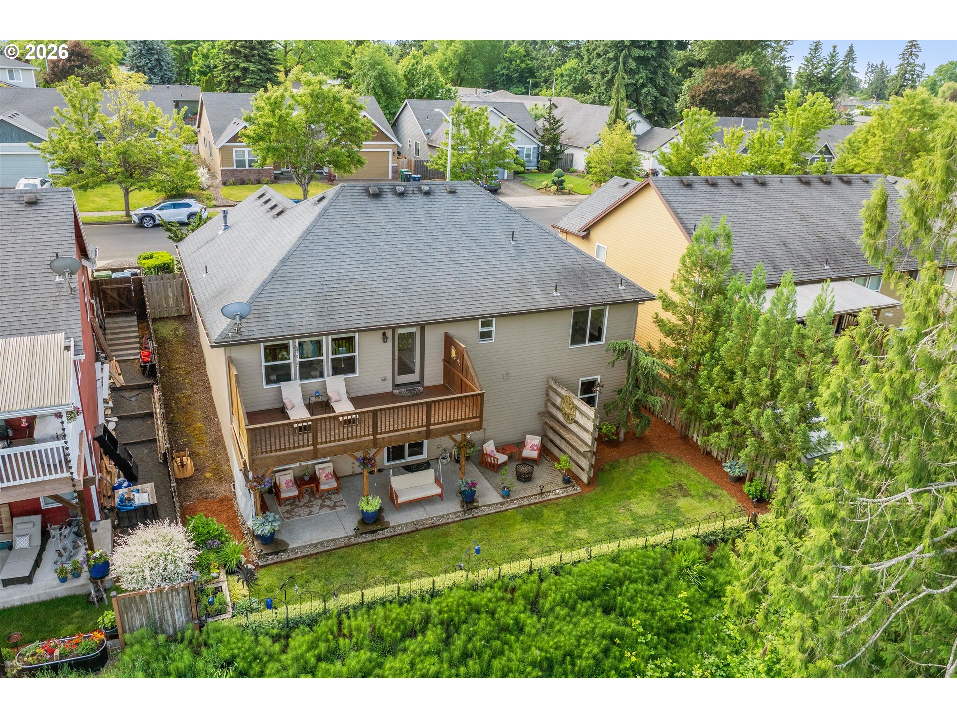 3769 10th Street Hubbard, OR 97032 - Photo 40 of 47 an aerial view of a house with garden space and street view
