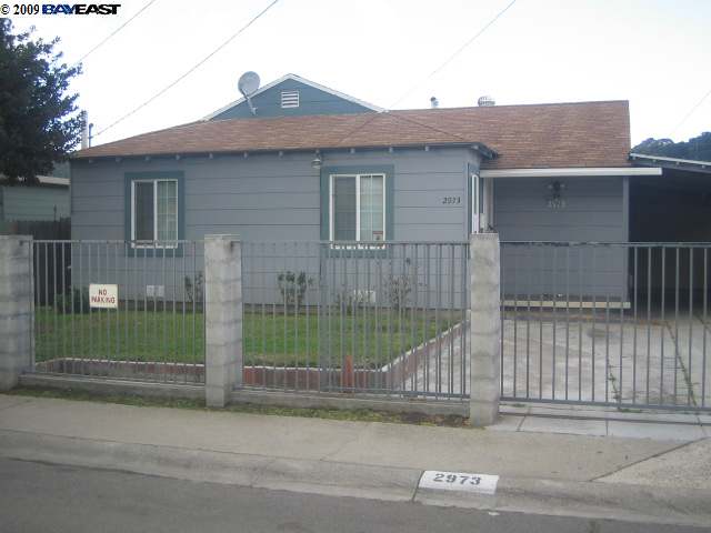 2973 Chevy Way San Pablo, CA 94806 - Photo 1 of 1 a view of a house with a small yard and plants