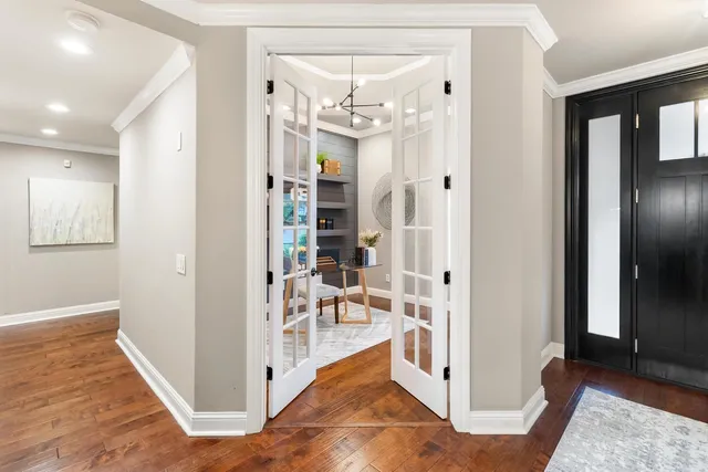 a kitchen with stainless steel appliances kitchen island granite countertop a sink and cabinets