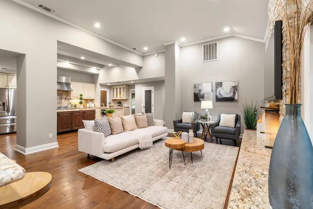a kitchen with stainless steel appliances granite countertop a stove oven and a sink
