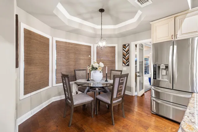 a bathroom with a shower and a sink