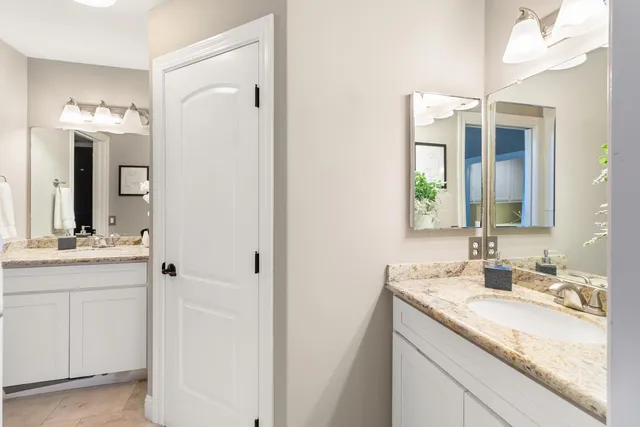 a view of a house with a yard porch and sitting area