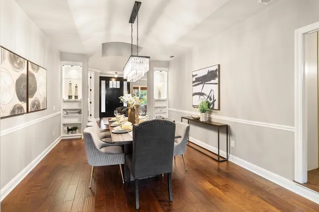 a view of a living room and hardwood floor