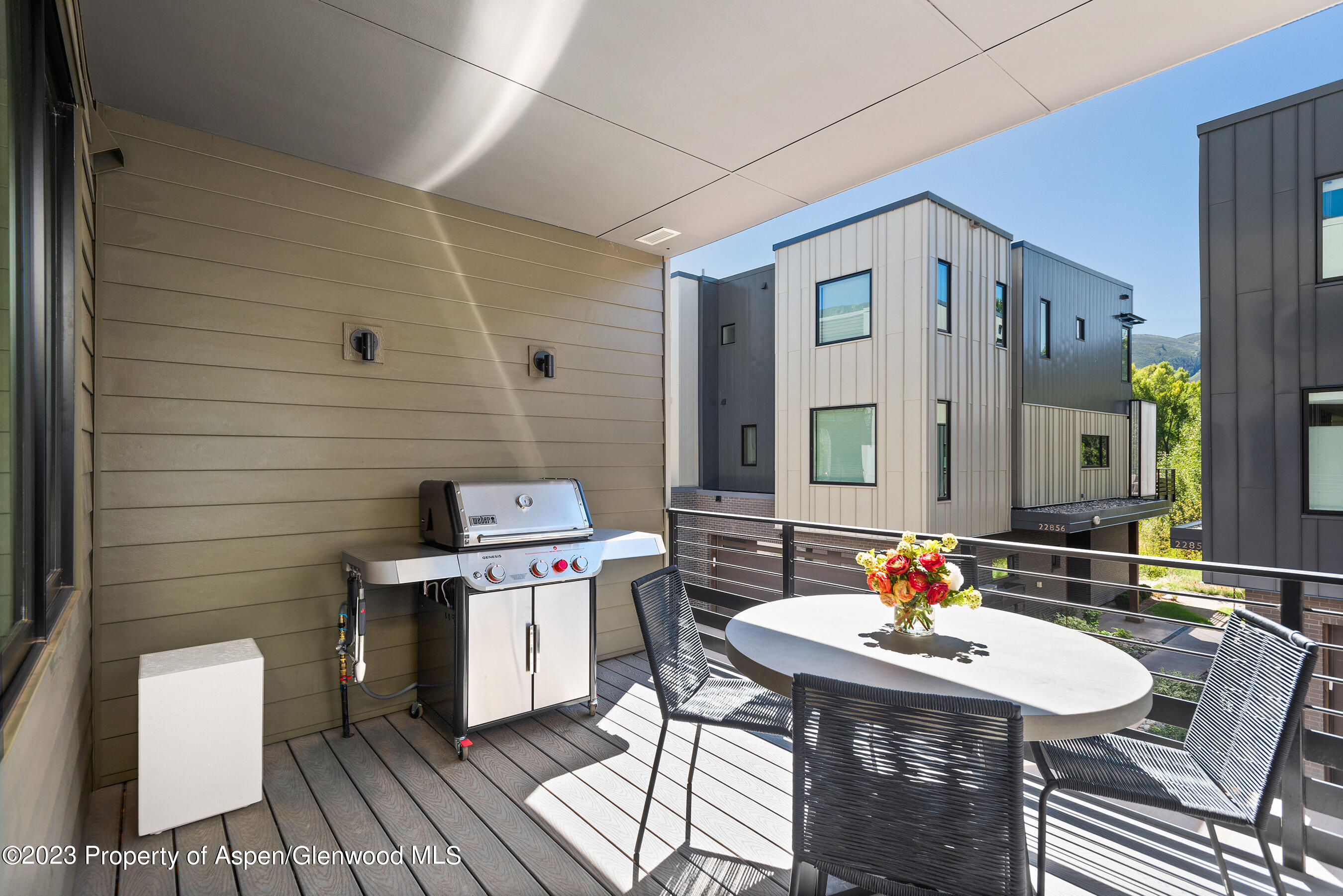 22842 Two Rivers Road, Unit 100 Basalt, CO 81621 - Photo 8 of 22 a outdoor space with furniture and mirror
