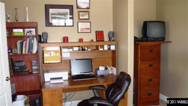 615 Royal Windsor Court Reno, NV 89521 - Photo 11 of 13 a work room with furniture and wooden floor