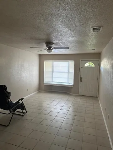 a view of a livingroom with a window