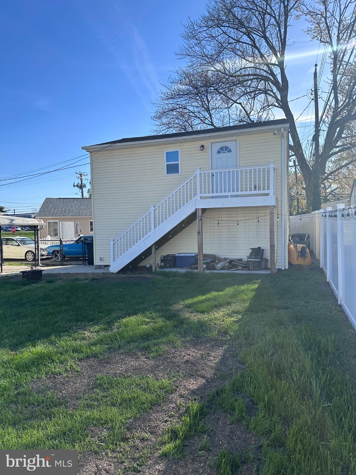 Charming two-story home with yard.