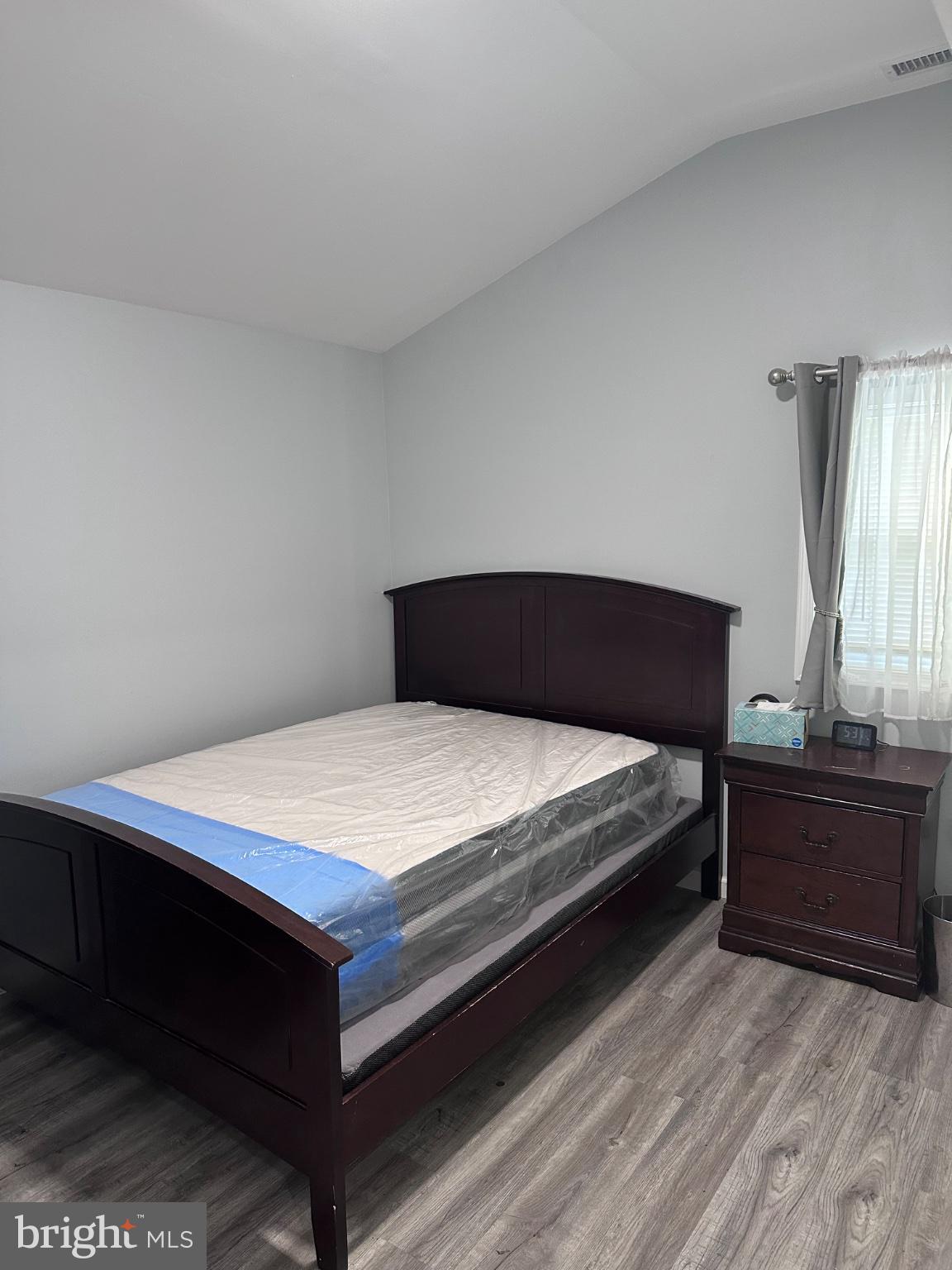 902 B Edgerly Road Glen Burnie, MD 21060 - Photo 12 of 12 Serene bedroom with vaulted ceiling.