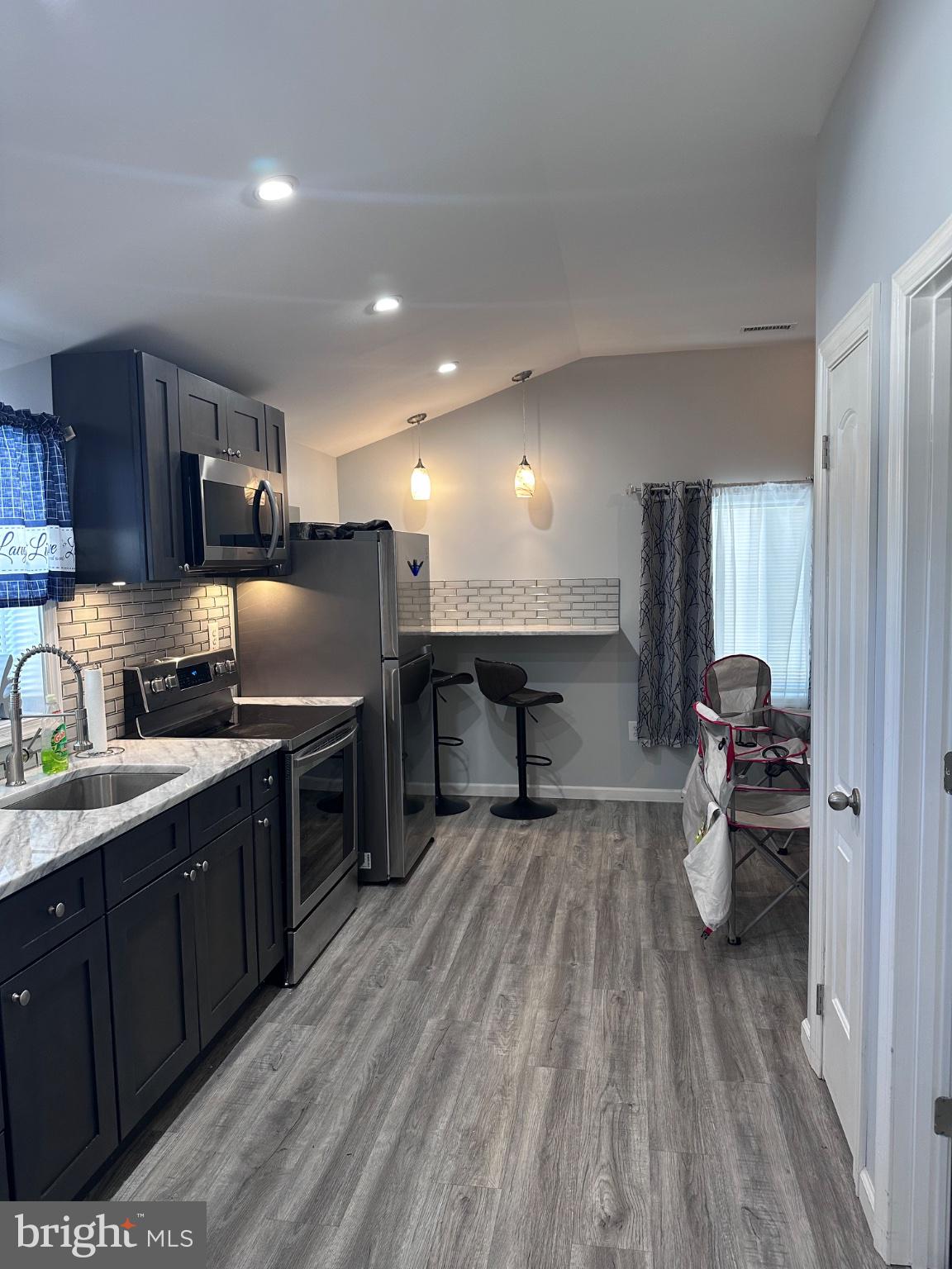 902 B Edgerly Road Glen Burnie, MD 21060 - Photo 4 of 12 Modern kitchen with sleek finishes.
