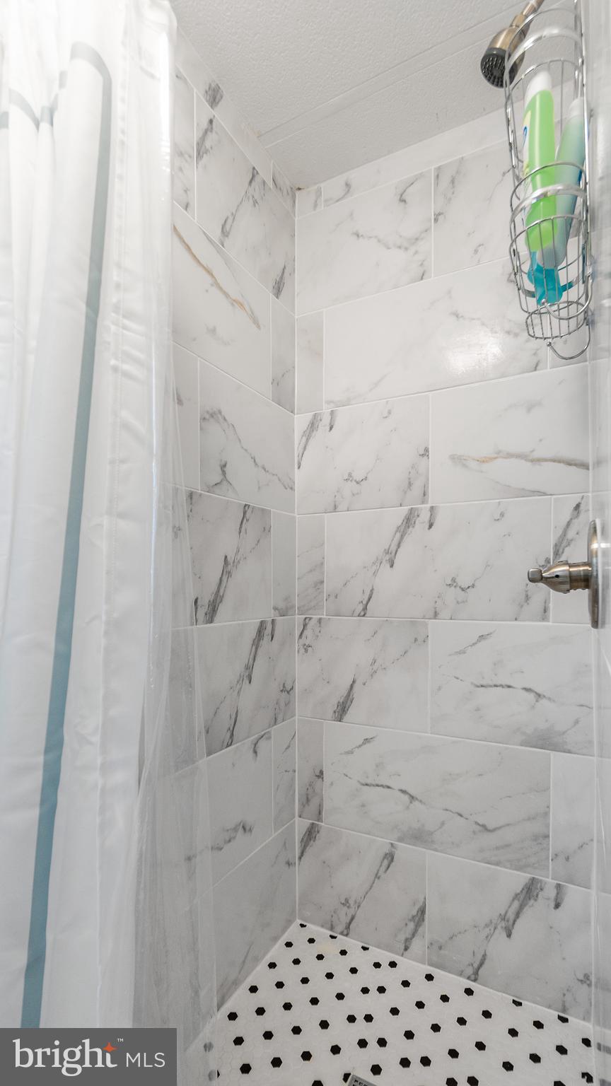 13324 Nantucket Road Ocean City, MD 21842 - Photo 20 of 45 a bathroom with a shower