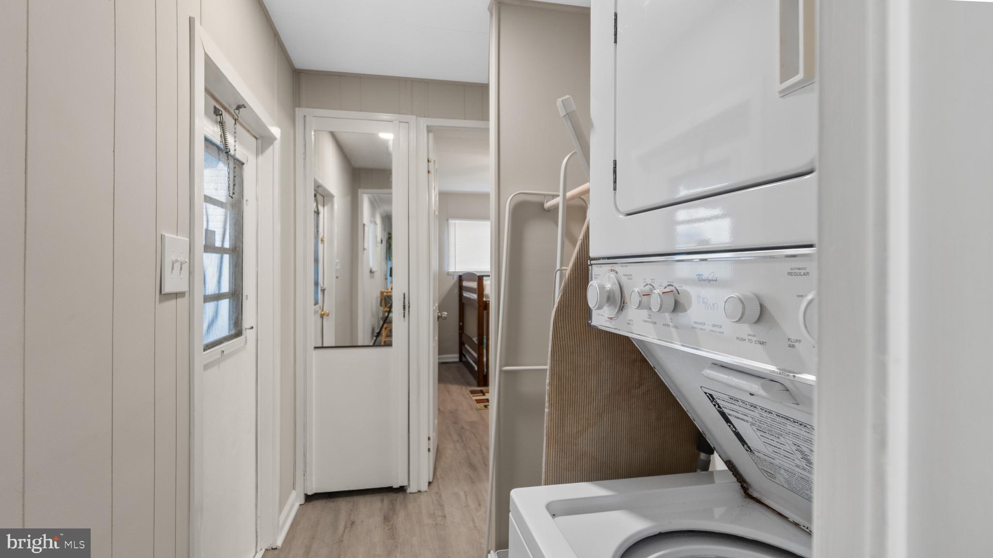 13324 Nantucket Road Ocean City, MD 21842 - Photo 25 of 45 a bathroom with a walk in closet and wooden floor
