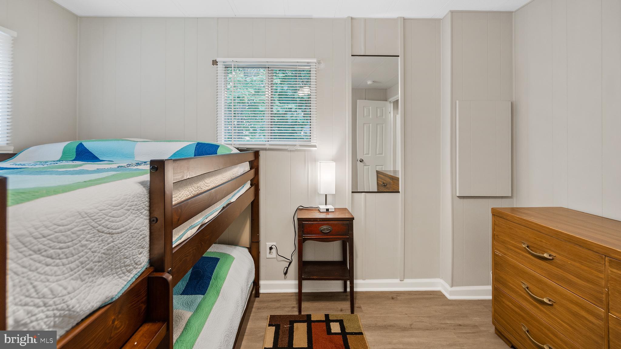 13324 Nantucket Road Ocean City, MD 21842 - Photo 29 of 45 a view of walk in closet with clothes and shoes