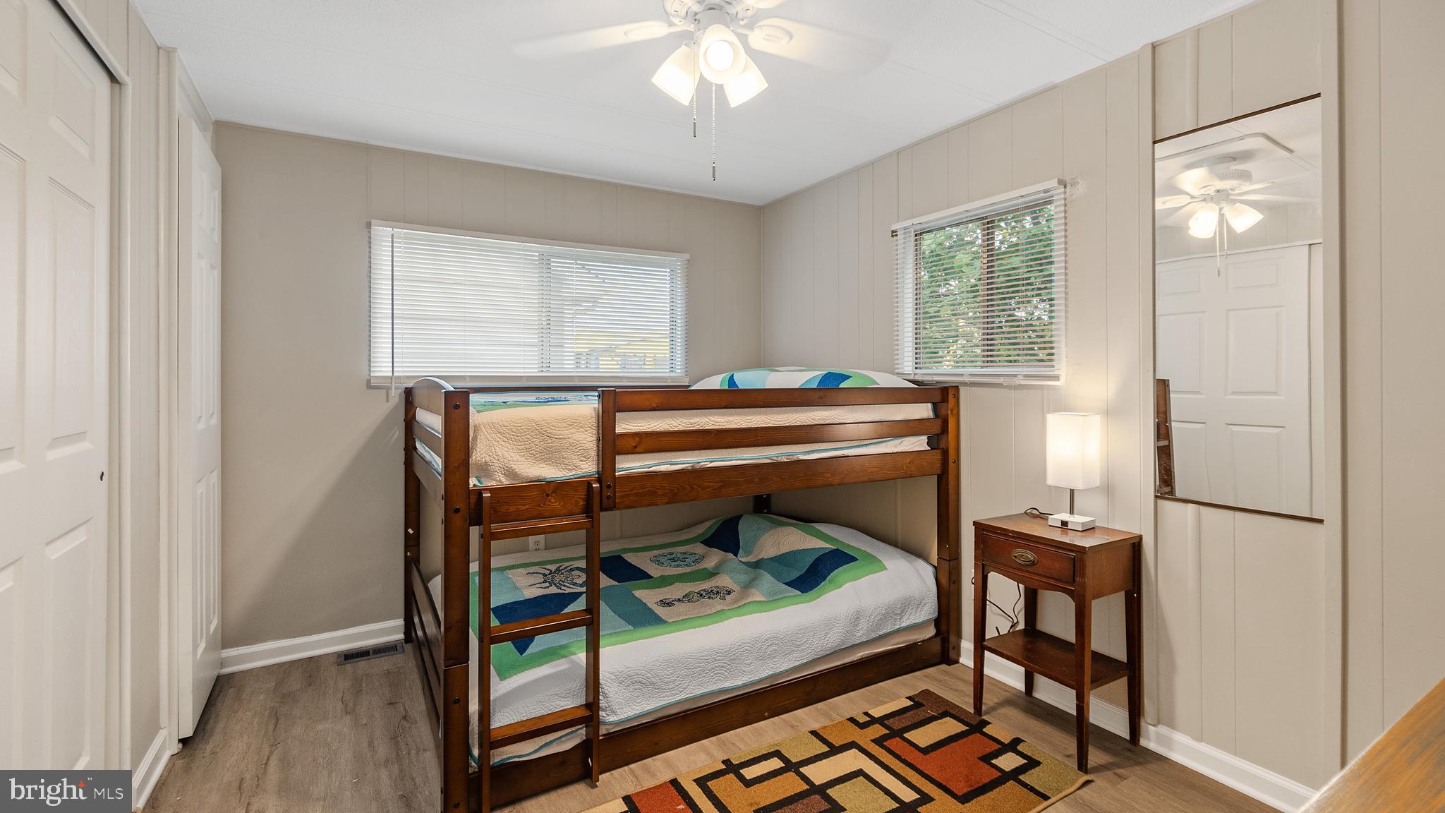 13324 Nantucket Road Ocean City, MD 21842 - Photo 30 of 45 a bedroom with bunk bed and a window