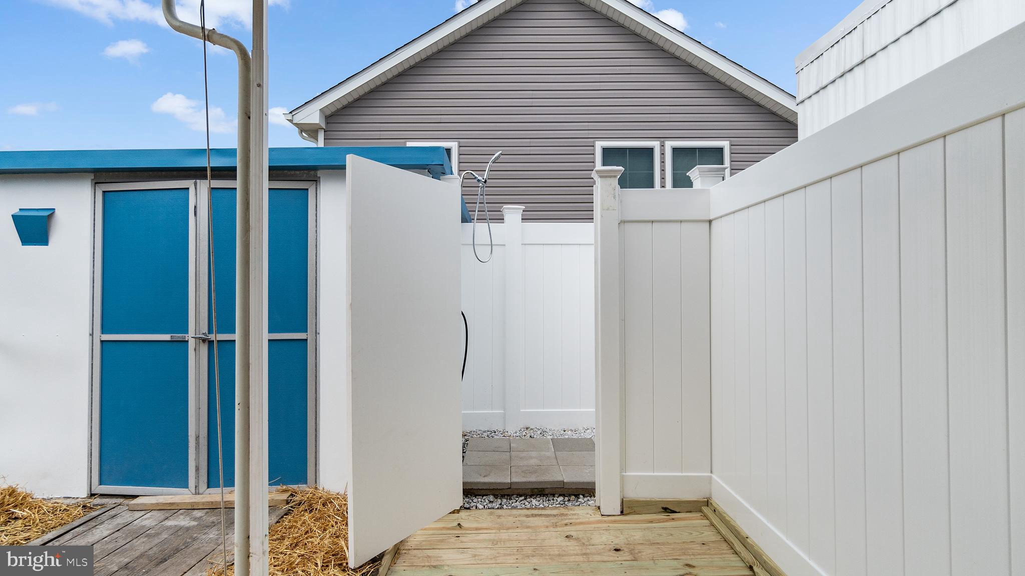 13324 Nantucket Road Ocean City, MD 21842 - Photo 5 of 45 a view of a house with a wooden door