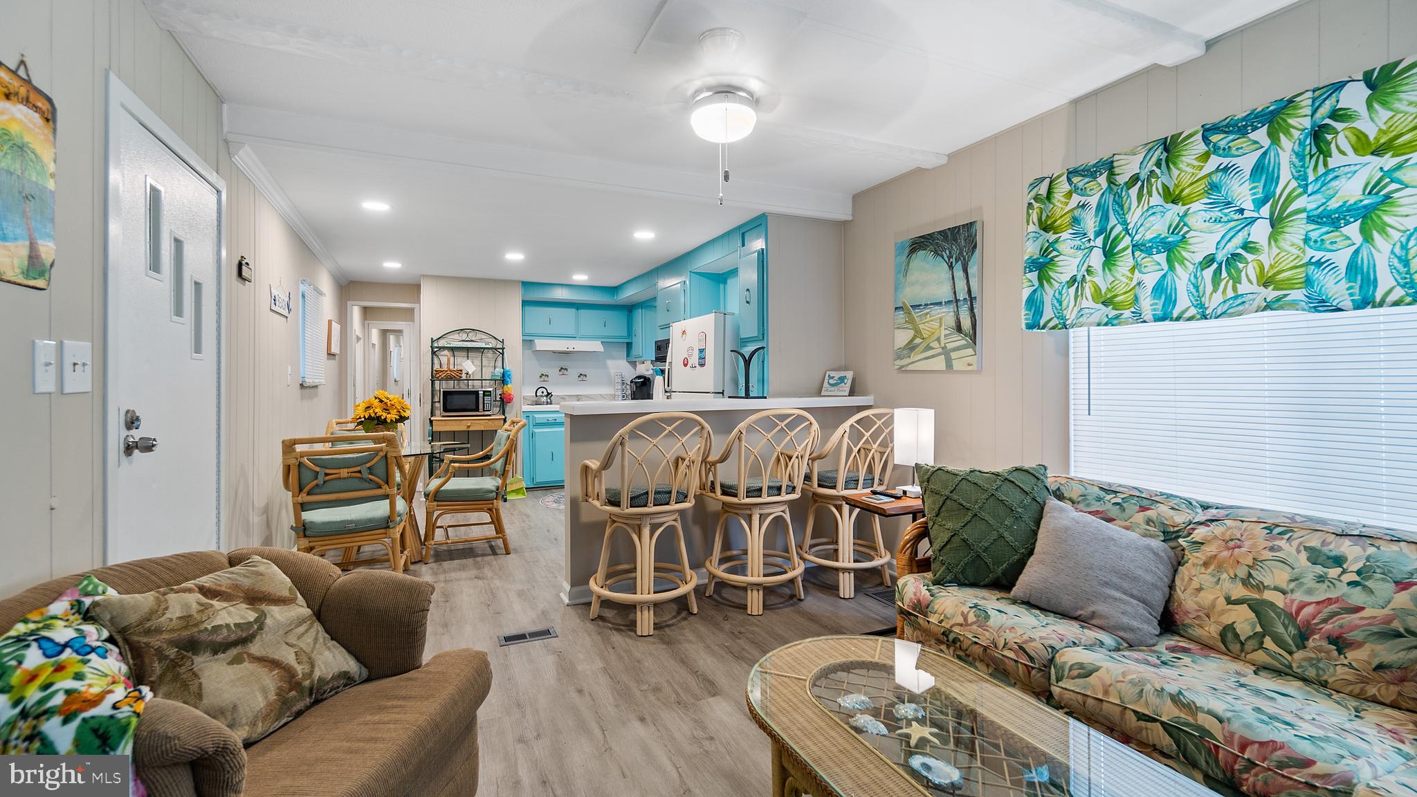 13324 Nantucket Road Ocean City, MD 21842 - Photo 9 of 45 a living room with furniture and a wooden floor
