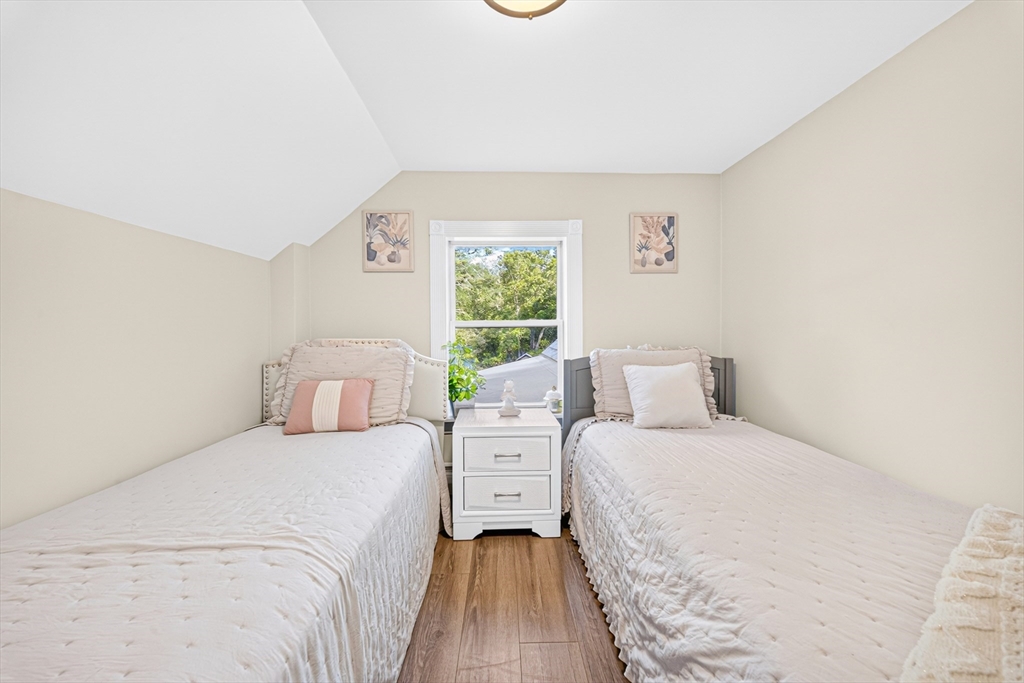 24 Miller Road Wilmington, MA 01887 - Photo 22 of 40 a bedroom with a bed and a window