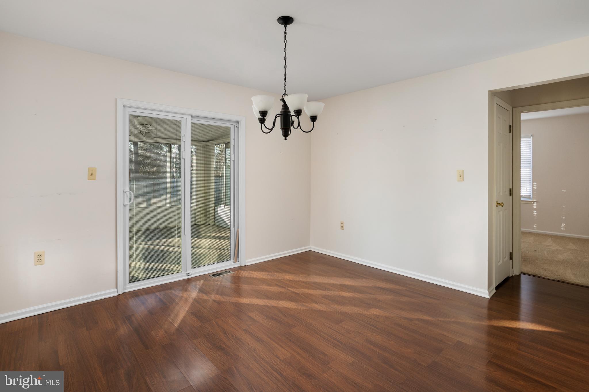 3 Escambia Trail Browns Mills, NJ 08015 - Photo 12 of 30 wooden floor in an empty room with a window