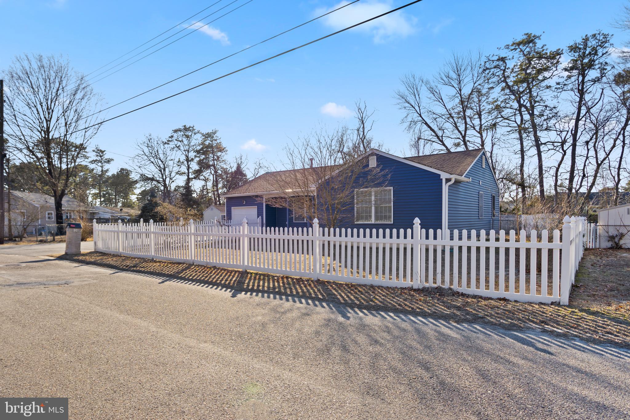 3 Escambia Trail Browns Mills, NJ 08015 - Photo 15 of 30 a view of a house with a wooden fence