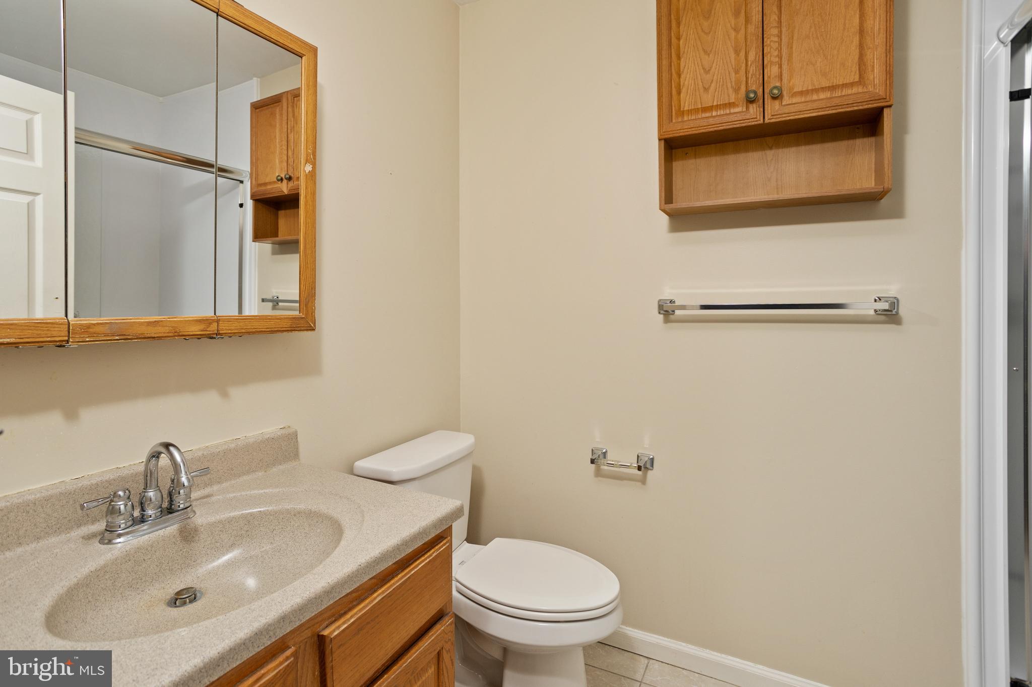 3 Escambia Trail Browns Mills, NJ 08015 - Photo 19 of 30 a bathroom with a sink a toilet and shower