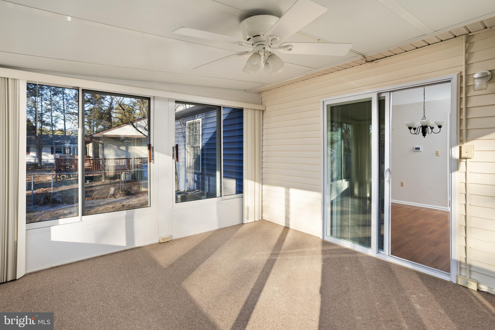 3 Escambia Trail Browns Mills, NJ 08015 - Photo 20 of 30 a view of a room with window and a ceiling fan