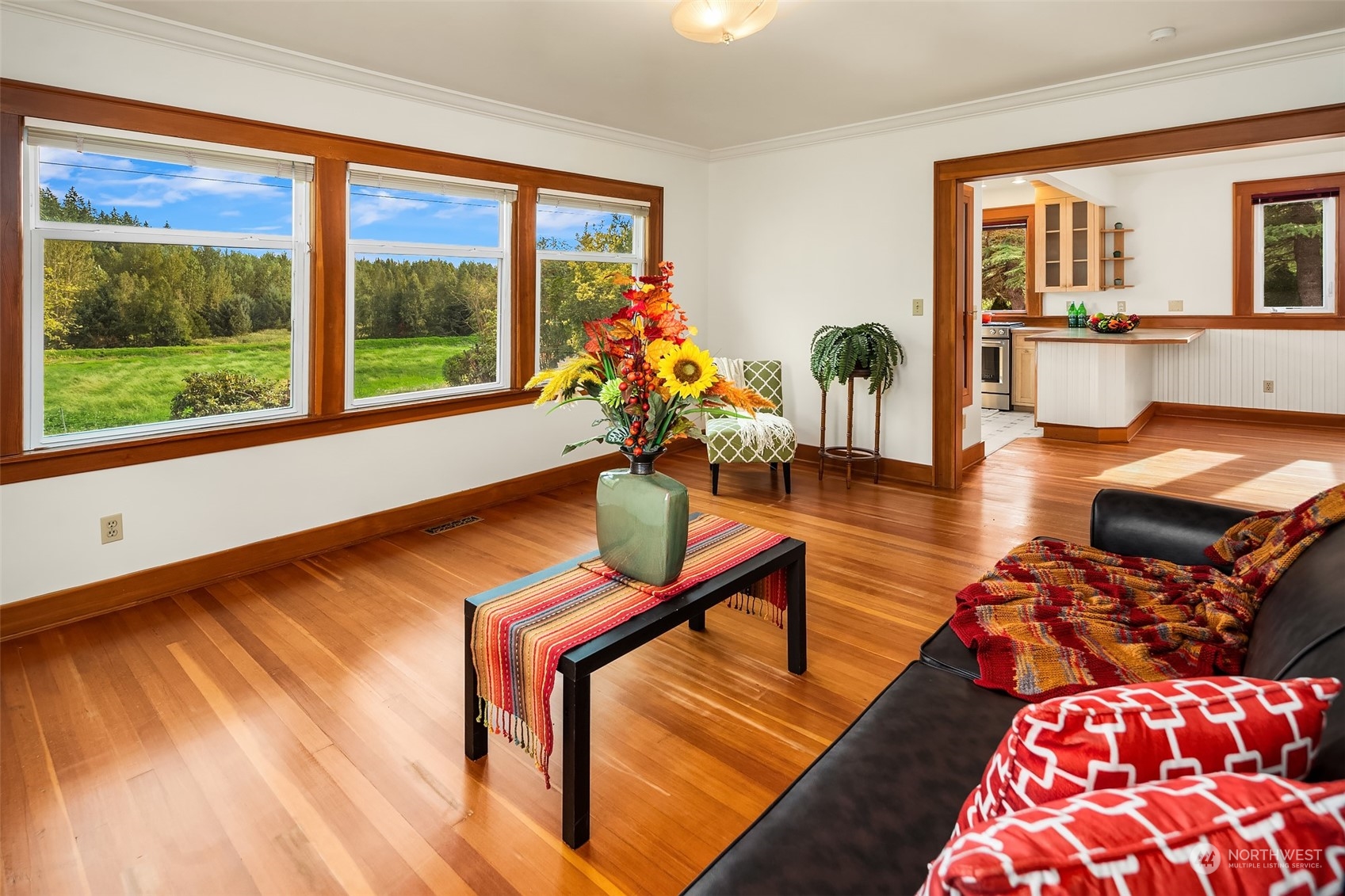 19589 Kelleher Road Burlington, WA 98233 - Photo 16 of 39 a living room with furniture and a wooden floor